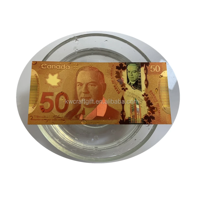Canadian currency 50 dollar money  CAD 50 gold silver foil in banknote vivid money image and size with showing stand