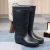 Import cheap plastic gumboots farming gardening and stockbreeding work black boots with yellow outsole from China