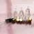 Import cosmetic packing gourd shaped essential oil  bottle 20ml clear perfume  bottles with cap wholesale from China