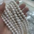 Import Natural cultured pearl Top quality wholesale white color 10-11mm perfect round no spots freshwater pearls long strings from China