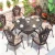 Import Outdoor aluminum garden table hot sales 2021 patio casting aluminum dining round table and chair set from China