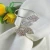 Import Wholesale diamond wedding decoration cheap bulk silver metal napkin holder ring from China