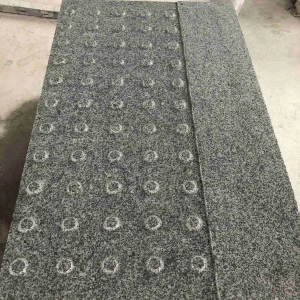 Medium grey tactile paving tiles