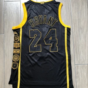 8# wholesale basketball jersey design polyester comfortable mens embroidered basketball jersey black color #24