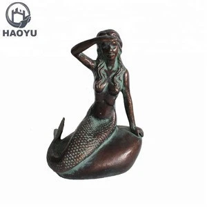 Abstract antique bronze metal mermaid sculpture