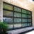 Import Black Anodized Aluminum Frame Automatic Frosted Tempered Glass Panels Garage Door prices from China