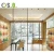 Import Boutique Shop Fittings Display Stand Handbag Store Interior Design Customized Gold Metal Display Table Bags Shop from China