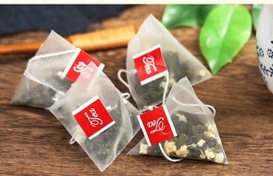 Chinese Flavored Tea Dried Fruit Sweet Peach Oolong Tea in Triangle Tea Bag