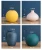 Import Fashionable Colorful Small Aromatherapy Bottles  Matte Delicate Ceramic decorative Flower Vase On Desktop from China