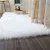 Import Home use long hair pile acrylic polyester synthetic sheepskin carpets and rugs for living room faux fur rugs from China