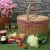 Import hot sale oval wicker picnic basket with wood lid and handle rattan nature storage basket from China