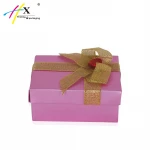 Light foldable paper candy box in pink color printing with butterfly knot