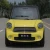 Import Low Price 4 Seat Four-wheel Electric Environmental Protection Small Electric Car from China