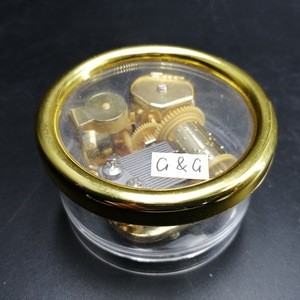 Mini Wind Up Gold Circle Acrylic Music Box For Toys
