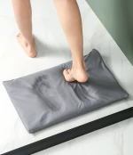 https://img2.tradewheel.com/uploads/images/products/2/2/natural-diatom-mud-absorbent-foot-pad-non-slip-quick-drying-floor-mat-for-bathroom-diatomite-foot-mat1-0436171001674304247-150-.png.webp