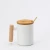 Import Promotional Items Custom logo Porcelain Ceramic Coffee Mug set with gift box Wooden handle Lid from China