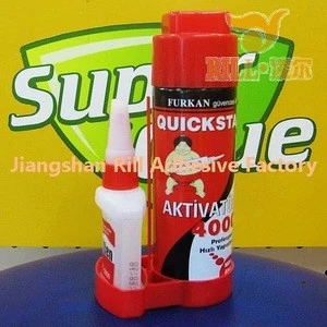 Spray activator adhesive