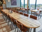 Heavy tables and chairs, restaurant full leather sofas, natural solid wood tables