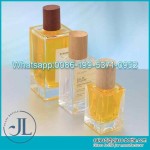 Custom new perfume glass bottle 50 ml sprayer with woonden lid manufacturer