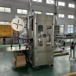 Automatic Sleeve Labels Trapping Wrapping Shrinking Machine Line Sleeve Round Foil Label Steam Shrinking Wrapping Machine