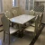 Import Chinese palace style stainless steel dining table from China