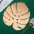 Import IN STOCK Gold Color Eco-Friendly Plastic Monstera Leaf Placemat for Kitchen Dining Accessories from China