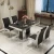 Import Modern simple tempered glass dining table rectangular stainless steel glass dining table and chair combination from China