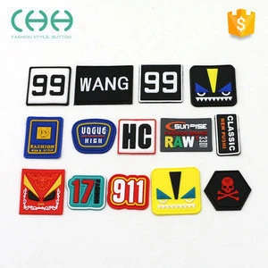 OEM custom cartoon clothing brand small leather 3d PVC soft rubber patch with logo