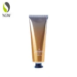 Plastic laminated cosmetic tube with screw cap
