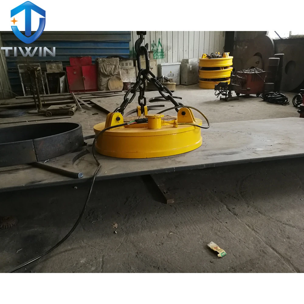 Powerful flat metal lifting magnet with cable reel and electric control cabinet