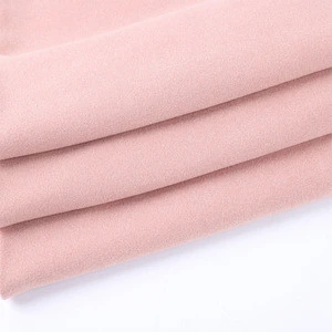 product in china single side knitted beige red  polyester super soft like cashmere fabric for baby blanket