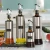 Import T129 Oil and Vinegar Cruet Dispenser Wine Pourers with Drip-free Spouts Stainless Steel Oil Dispenser Soy Sauce Seasoning Bottle from China