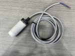A plastic part for a sensor accessory