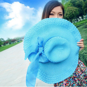 A wide-brimmed straw hat for uv protection and shade/hot sale summer straw cowboy hat