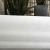 Import China factory polypropylene spunbonded cross nonwoven technical white embossed fabric from China