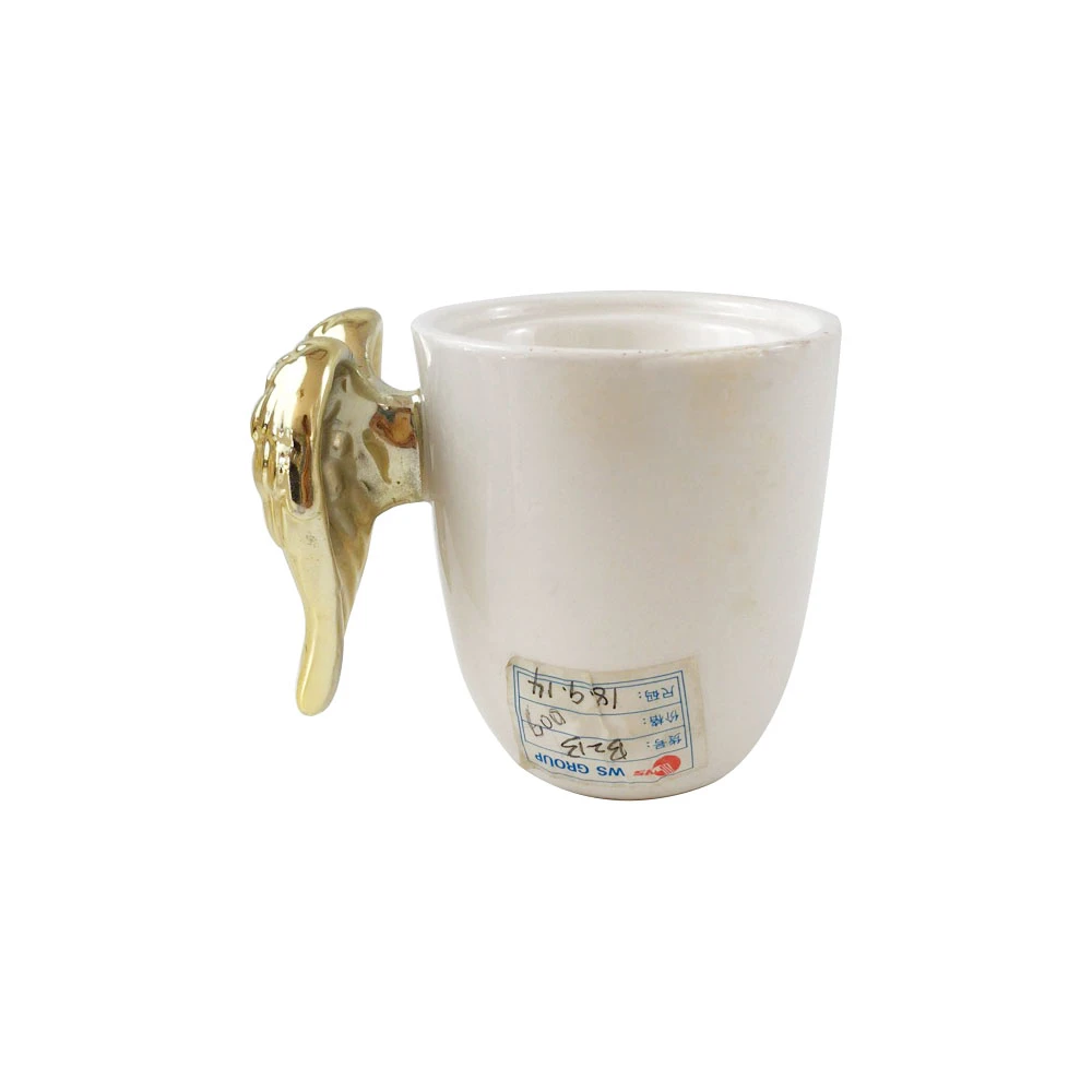 chinese creative eco  custom logo cute angel wing white ceramic coffee drinkware mug supplier with gold handle for girl
