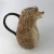 Import hedgehog decorative ceramic water pitcher milk jug with handle from China