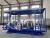 Import mid rise with hydraulic flat for low vehicles mini small 19ft 4000kg auto 10m large scissor lift from China