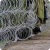Import raw material iron or steel type razor wires for fencing from China