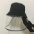 Import wholesales cheap new fashion fisherman hat with face shield for women bucket hat with shield black from China
