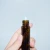 Import Amber clear black empty glass roller ball perfume bottle 5ml 10ml roll on fragrance bottles from China