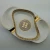 Import Best selling oval ceramic ashtray with golden edge with two golden rest with customized logo for sale from China