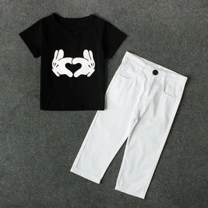 Children&#039;s foreign trade European and American summer boy black T-shirt + white pants two pieces