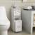 Import floor free standing white PVC foam board waterproof bathroom furniture set storage cabinet with invisible trash can from China