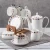 Import Graceful food grade china tea coffee sets , tea cup saucer , 15pcs porcelain tea set with gold handle for wedding from China