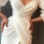 Import KEN-57492 women black party draped dress white off shoulder low cut high slit long cocktail dress from China