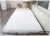 Import New Design Polyester Faux Fur Carpet Faux Sheepskin Fur Rug from China