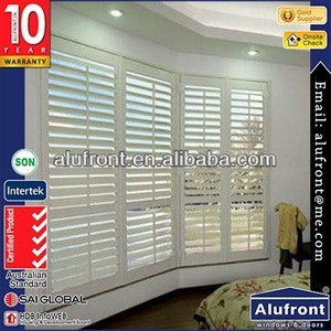 openable plantation shutter with wood color frame