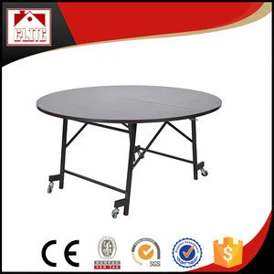Used folding round banquet table with casters