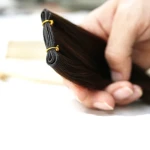 Wholesale High Quality Virgin Genius Weft Cuticle Aligned Double Drawn Russian Remy Hair Seamless Genius Hair Weft Extensions